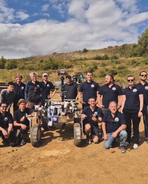 Airbus iBB4 field-test team beside the rover